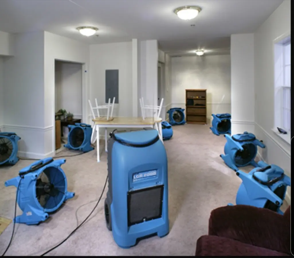 Air movers and dehumidifier setup for Water Damage Restoration in Newberry